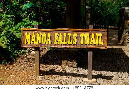 Manoa Falls Trail sign on Oahu Hawaii. Manoa Falls is one of the most popular hikes on the island and brings in tourists from all over the world.