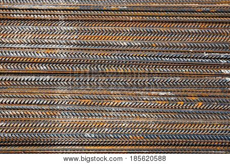 Thick rusty reinforcing bar metal, pattern, texture.