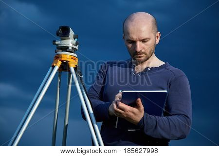 Male surveyor for the device in inclement weather