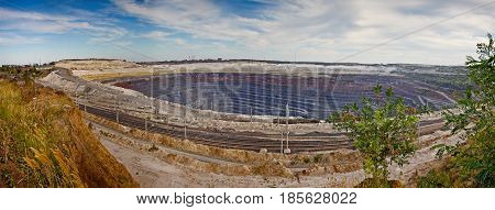 Panorama of the quarry for ore extraction. Pit of the Stoilensky Mining and Processing Plant