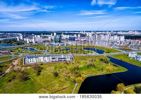 Aerial view, cityscape of Minsk, Belarus. District of the national library, parks and cannels, Top view from the drone