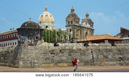 Cartagena de Indias, Bolivar / Colombia - April 10 2016: View of walled city with San Pedro Claver church in background. Cartagena's colonial walled city was designated a UNESCO World Heritage Site