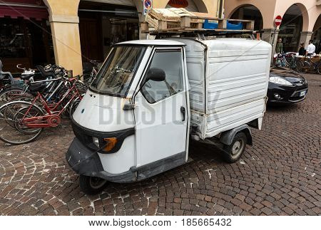PADUA ITALY - MAY 3 2016: Piaggio Ape50 in Rome. Piaggio Ape is a three-wheeled light commercial vehicle first produced in 1948 by Piaggio. Padua Italy