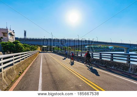 Riverside cycling on a sunny day in Taipei