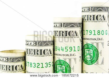 rising steps made of one american dollar banknotes on white bakground