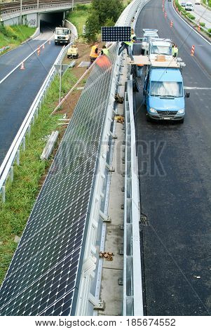Workers During The Installation Of Solar Panels