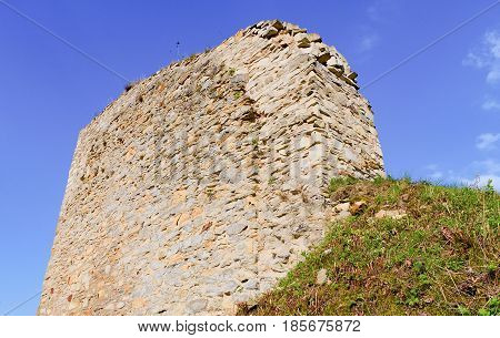 Ruins of fortification (bulwark). Medieval rampart. Closeup.