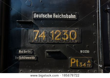 BERLIN - APRIL 21: Detail of an old steam locomotive Spring Festival Exhibition in the Rail yard Schoeneweide April 21 2013 in Berlin Germany