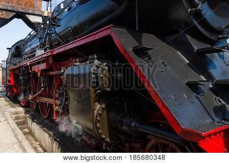 BERLIN - APRIL 21: Detail of an old steam locomotive Spring Festival Exhibition in the Rail yard Schoeneweide April 21 2013 in Berlin Germany