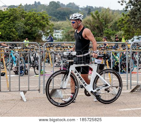 Nahariyya Israel - May 06 2017 : Participant of the annual triathlon starts from the start in the competition in cycling in Ahziv near the town of Nahariya