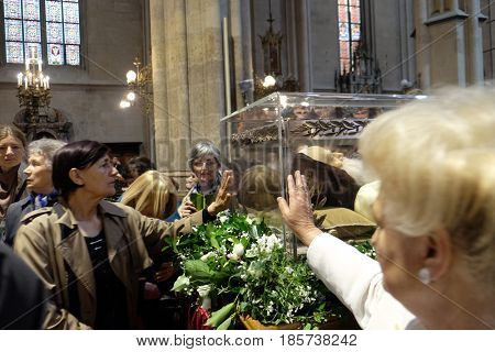 ZAGREB, CROATIA - APRIL 14: Worshippers gather to look at the relics of St. Leopold Mandic in Zagreb cathedral, Zagreb, Croatia on April 14, 2016.