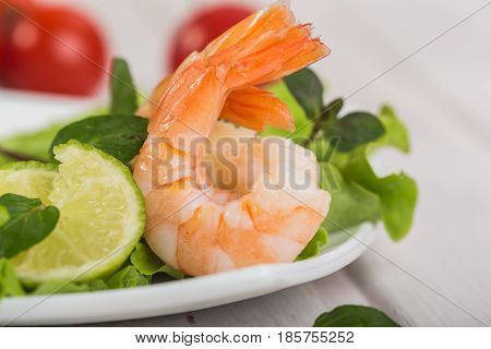 Prawn salad. Healthy Shrimp Salad with mixed greens and tomatoes. Diet. Weight Loss Food. Shrimps