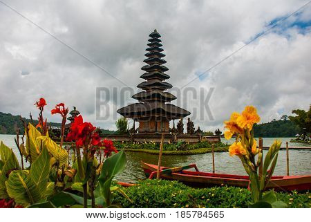 Pura Ulun Danu Batur Temple In Lake With Flowers. Bali, Indonesia.