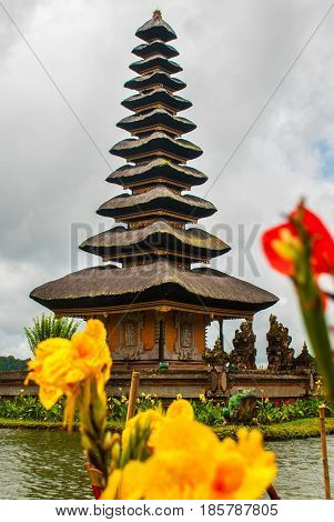 Pura Ulun Danu Batur Temple In Lake With Flowers. Bali, Indonesia.
