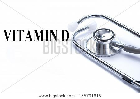 Page with VITAMIN D on the table with stethoscope medical concept.