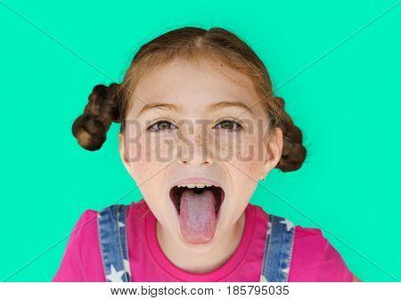 Little Girl Smiling Happiness Sticking Out Tongue Studio Portrait