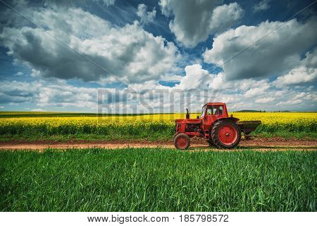 Red Tractor In A Field