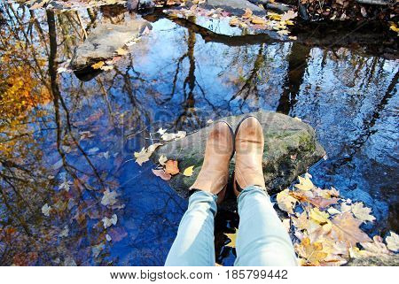 leather booties and green pants in the fall sitting on a rock in a stream with a reflection from the trees

air,autumn,blue,booties,boots,breathe,color,colorful,crisp,dead,dying,fall,foliage,fresh,glisten,gray,green,lake,leather,life,meditation,mindful,na