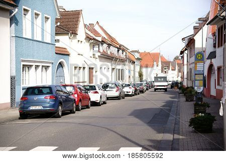 MAINZ, GERMANY - MARCH 22: The main traffic route of the district Gonsenheim with adjoining houses as well as parking spaces on March 22, 2017 in Mainz.
