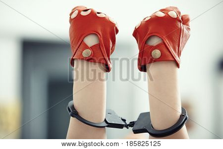 Two human hands in wristlets. Horizontal photo