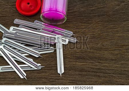 Close up capillary tube with blood lancet Medical equipment on wooden backgroundselective focus.