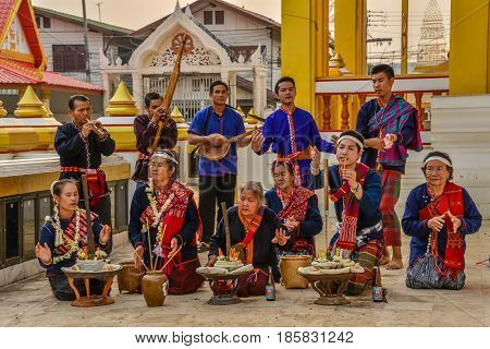 NAKORN PHANOM THAILAND - FEBRUARY 14, 2015 : Thai northeastern Phutai people show ancient rite of worship to household spirit in Phutai world event day in Renunakorn of Nakorn Phanom, Thailand.