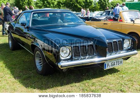 PAAREN IM GLIEN GERMANY - MAY 19: Mid-size car Pontiac Grand Am The oldtimer show in MAFZ May 19 2013 in Paaren im Glien Germany