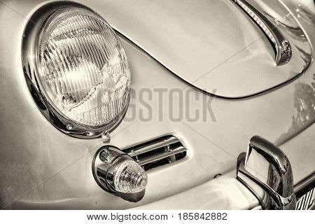 PAAREN IM GLIEN GERMANY - MAY 19: Detail of the front of the sports car Porsche 356 black and white "The oldtimer show" in MAFZ May 19 2013 in Paaren im Glien Germany