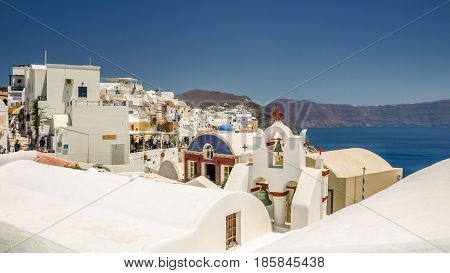 view of oia in santorini and part of caldera