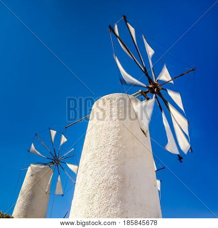 view of an old mill in crete near lasithi plateau