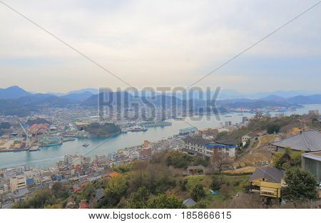 Onomichi city cityscape in Hiroshima Japan. Onomichi is a historical city with many temples and small alleys.