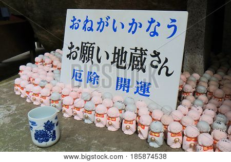 HIROSHIMA JAPAN - MARCH 18, 2017: Buddha statue in Onomichi  historical street.