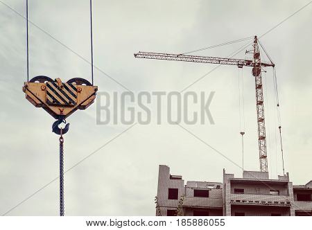 Crane And Building Construction Site.