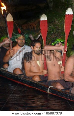 Maori Man In Traditional Waka Boat