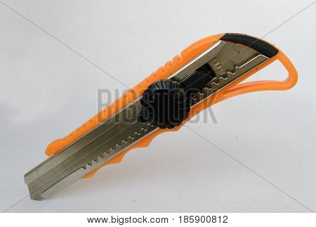Paper Cutter orange color with white background