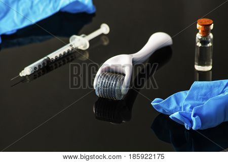 Dermaroller for medical micro needling therapy. Tool also known as: Derma roller, mesoroller, meso-roller, mesopen.