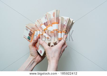 Hand Holding Many Of The Russian Banknotes