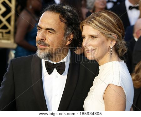 Alejandro Gonzalez Inarritu and Maria Eladia Hagerman at the 88th Annual Academy Awards held at the Hollywood & Highland Center in Hollywood, USA on February 28, 2016.