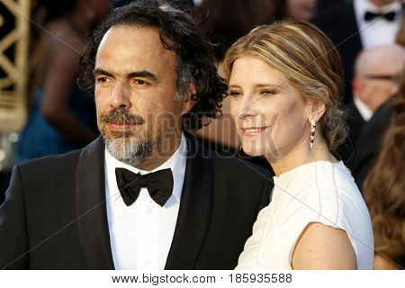 Alejandro Gonzalez Inarritu and Maria Eladia Hagerman at the 88th Annual Academy Awards held at the Hollywood & Highland Center in Hollywood, USA on February 28, 2016.