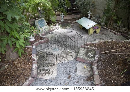 KEY WEST USA - AUG 27 2014: graveyard for the cats in Earnest Hemmingways garden. The cats are named like famous actors.