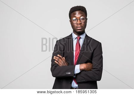 Portrait Of African American Business Man With Folded Arms, Isolated On Greybackground