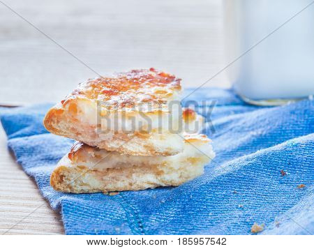 Traditional russian pasties Shanga - opened circle pie with cottage cheese. Close up view of carols cheesecake with cottage cheese. Copy space.