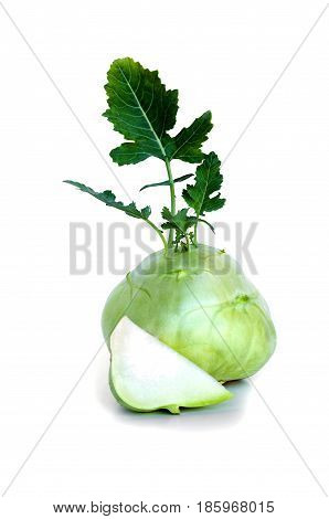 Fresh Kohlrabi With A Cuted Piece And Green Leaves On Isolated White Backround