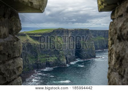 View over Cliffs of Moher on a overcast, cloudy and gloomy day, Ireland