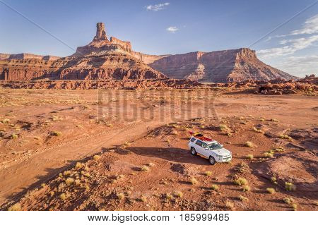 POTASH , UT, USA - MAY 7, 2017:  Toyota 4runner SUV (2016 trail edition) with a kayak on roof on a desert trail in the Moab area.