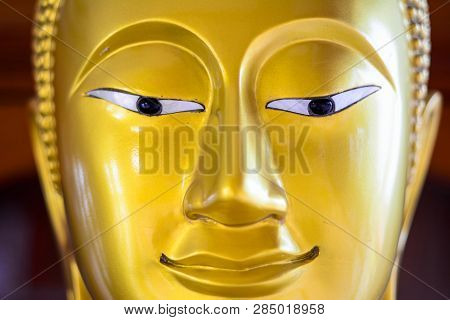 Golden And Beautiful Buddha Image Face, Calm And Peaceful