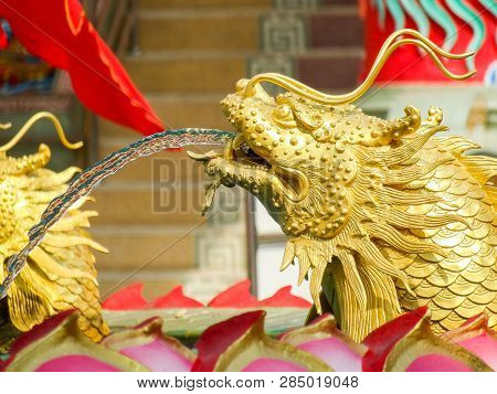 Chinese Dragon Pours Water Out Of Mouth