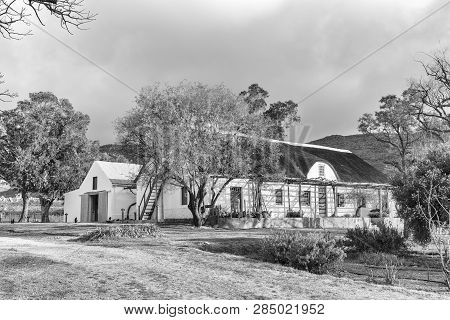 Kromrivier, South Africa, August 25, 2018: An Historic Farm House And Barn At Kromrivier Cederberg P