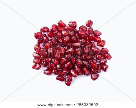 Pomegranate Seeds Isolated On White Background. Ripe Pomegranates Close-up. Sweet And Juicy Garnet W
