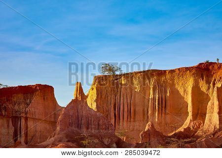 View Of The Marafa Canyon In Kenya. Hells Kitchens A Gigantic Canyon-shaped Space Caused By Soil Ero